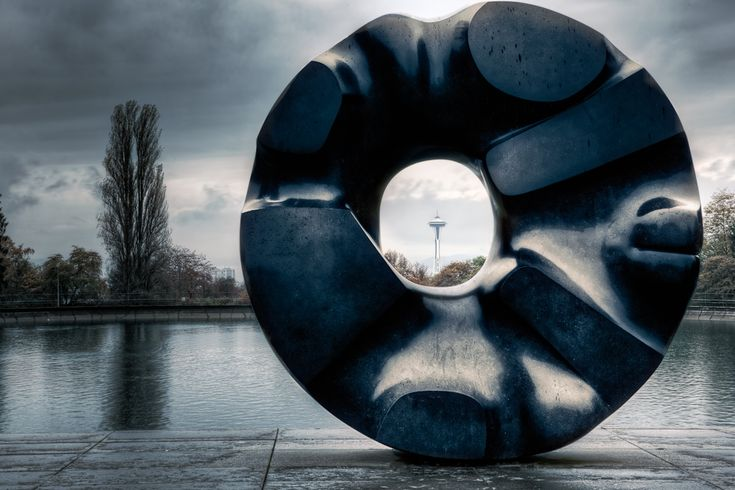 Noguchi was a celebrated sculpter and public artist. His main works were at 666 5th Avenue ("A Landscape of Clouds") 1957, "Black Sun" in Seattle (1969), "Red Cube" on Broadway (1968) and "Skygate" in Honolulu (1977). All of these have a distinct symbolism.