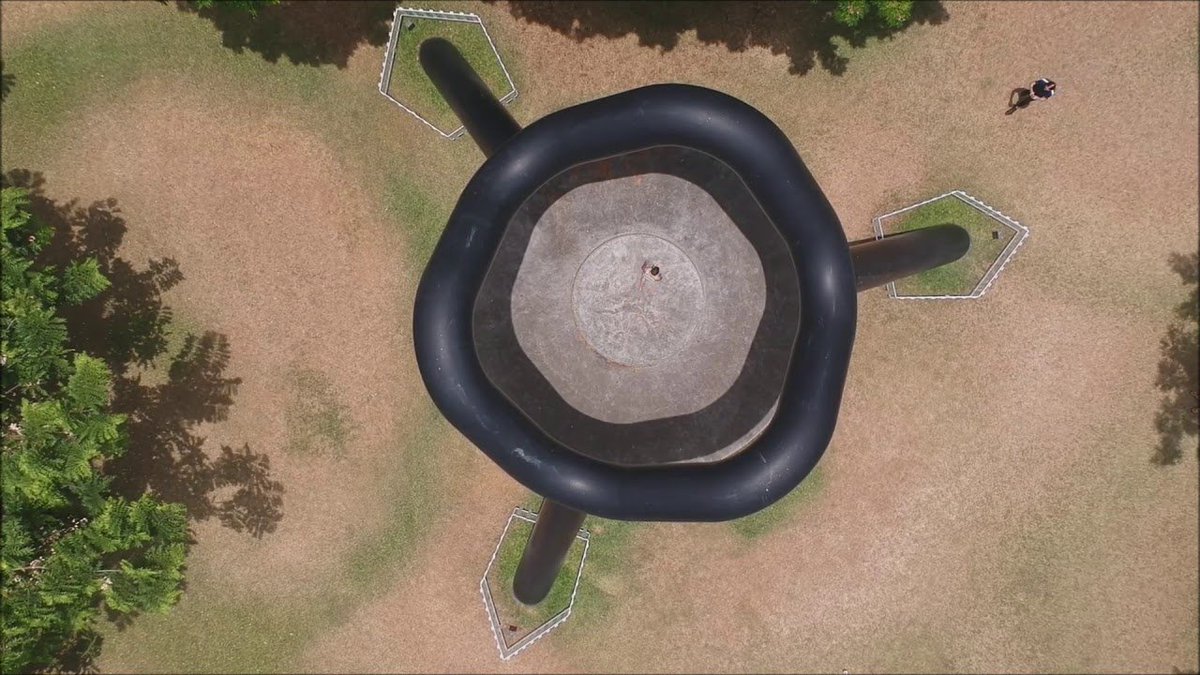 Noguchi was a celebrated sculpter and public artist. His main works were at 666 5th Avenue ("A Landscape of Clouds") 1957, "Black Sun" in Seattle (1969), "Red Cube" on Broadway (1968) and "Skygate" in Honolulu (1977). All of these have a distinct symbolism.