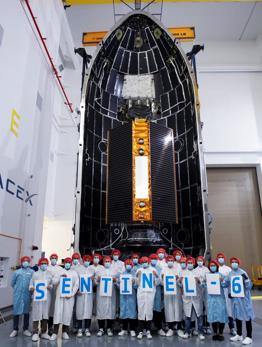 ESA_EO's tweet photo. We cannot see their smiles... but we are SURE they are smiling😆! 
Pictured here is the @esa #Sentinel6 team in front of the @CopernicusEU Sentinel-6 Michael Freilich satellite, right before encapsulation. 

Thanks for all the hard work 💪🛰️ https://t.co/0CO4HZf5UK https://t.co/Ec5A7QroPh