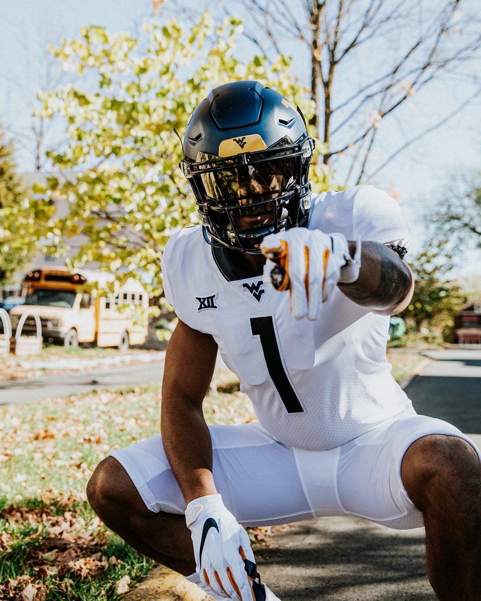WVUfootball's tweet photo. 1 State. Together.

#HailWV https://t.co/g62IrsP5lJ