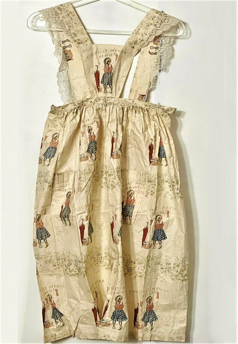 SagaMenier's tweet photo. Tablier de serveuses #chocolat #menier des #Exposition #universelle de 1900 et 1914. @villedenoisiel #mode #costume #histoire #chocolate #chocolat #culture #tradition #11novembre  #couture https://t.co/W2APbKBn3r