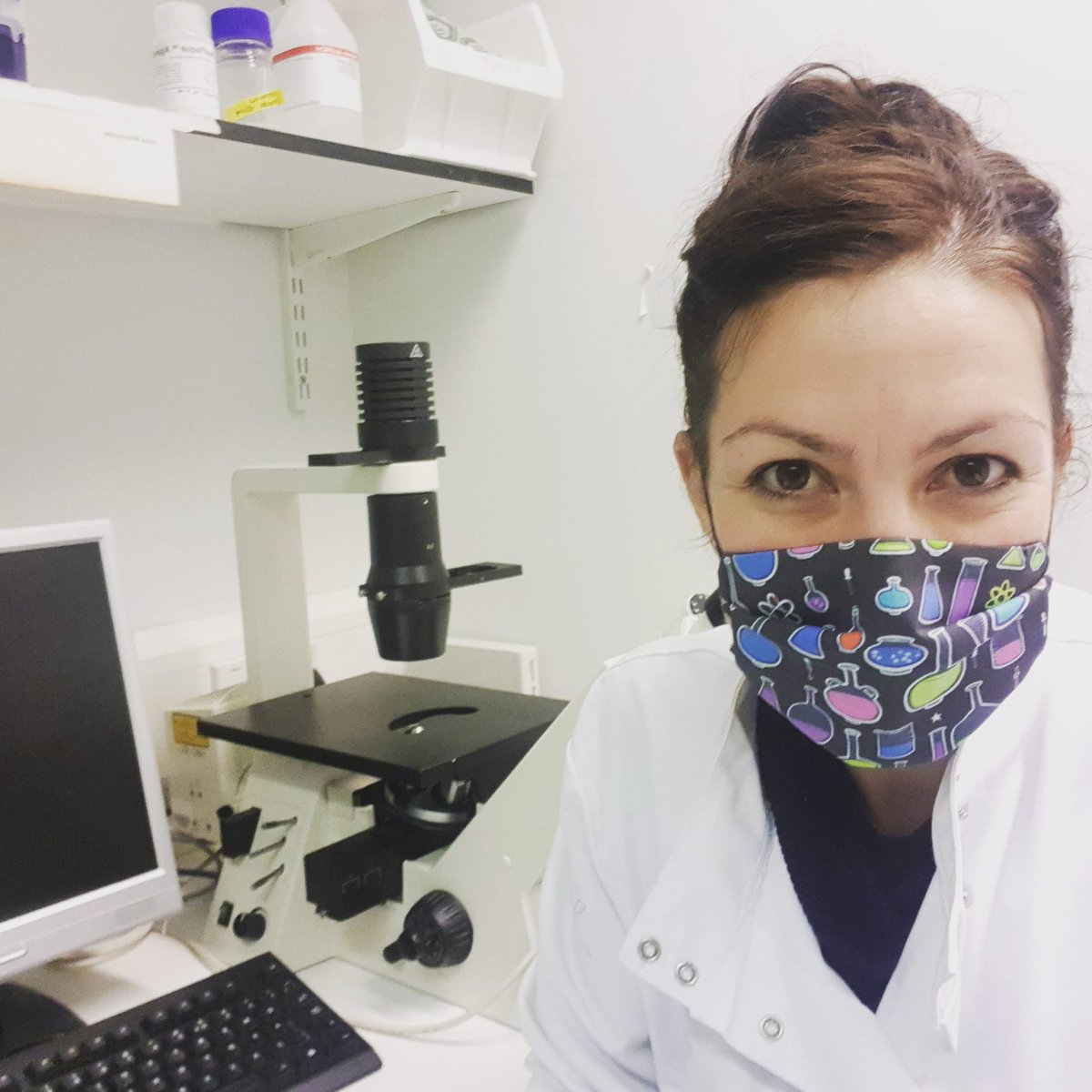 Nothing says "I'm a scientist" quite like a white lab coat plus science themed face mask (with obligatory microscope in background, of course)  #respiratoryresearch #covid19 #respisbest #researchrocks #Science