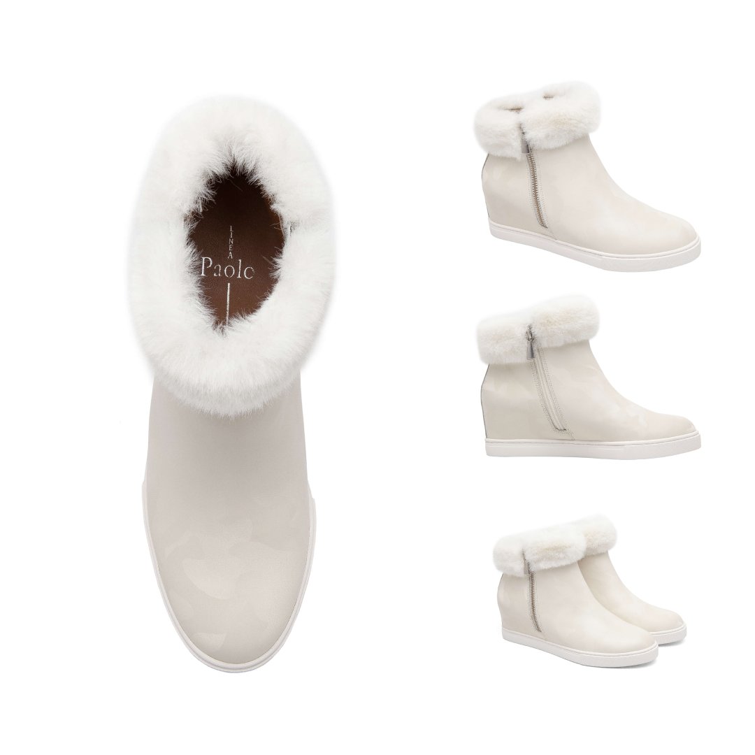LINEAPaoloShoes's tweet photo. The difference is in the details. Look closely 👀at FLOSSIE II done-up in subtle ivory camo print  leather.
https://t.co/QNxUmcOS89
#lineapaolo #lineapaoloshoes #sneakerwedges #wedgebooties #fauxfur #winterbooties #limitededitionsneakers #winterwhite #camoprint #camoprintsneakers https://t.co/xQiG7OmsZA