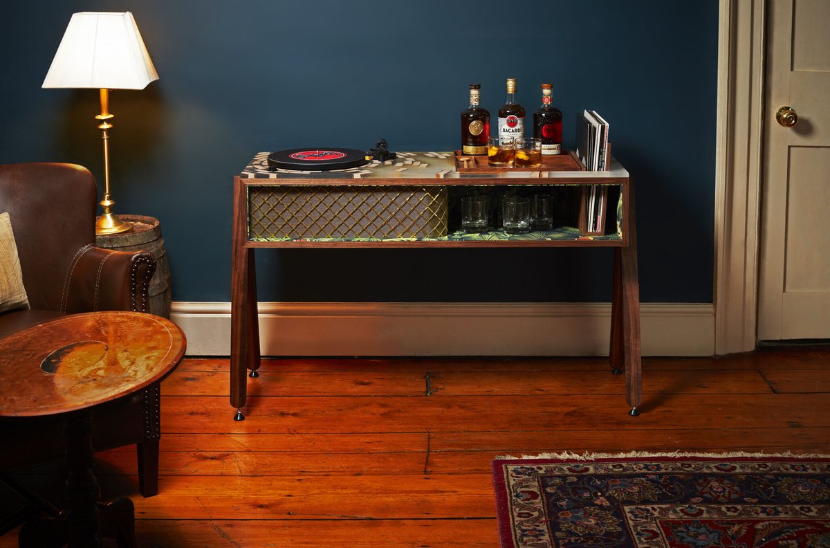 This is such a cool piece of furniture: a limited-edition, vinyl-playing, rum-mixing console, made from the oak barrels that aged the sweet spirit. Looks as good as it sounds 🍹