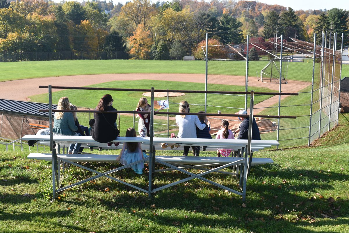YorkSuburban's tweet photo. Mrs. Taylor, a Trojan Online Pathways teacher, organized an outdoor reading session for her kindergarten students. The weather was perfect, and the picturesque backdrops provided by @ValViewElem and @YorkSuburbanHS's baseball field made it a great outing! https://t.co/Rt4TPNNVYP