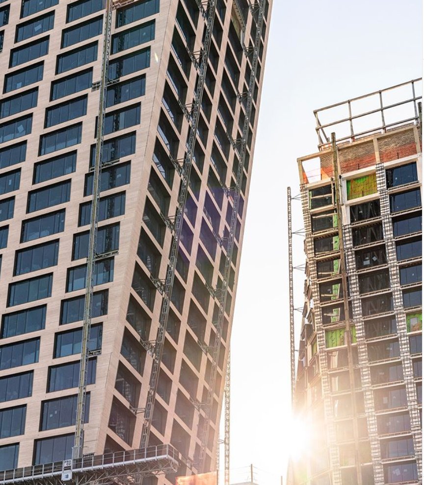 Early morning sunlight, rising between the twisting towers of @TheXInyc. Photo by: <a href="/WeAreOptimist_/">Optimist Consulting</a>