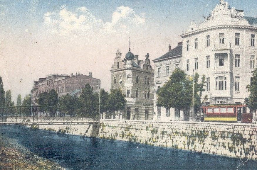 They used to throw away ashes and charcoal from their stoves into the Miljacka below the bridge, hence the name, Ćumurija (ćumur=charcoal). Because of several floods & damages bridge was fixed & restored several times but it was finally replaced with metal construction in 1886.