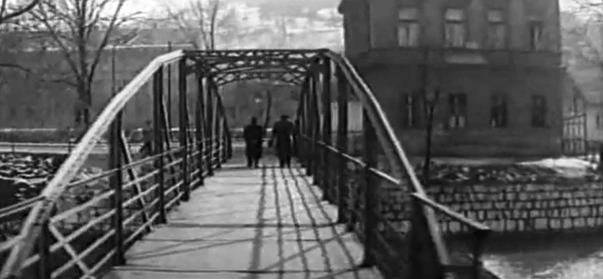 It was constructed by Adolf Kunert. From 1918, the bridge had official name Zrinjskog most (Bridge of Zrinski) named after Croatian Ban Petar Zrinski. In 1993, during the war in Bosnia and Herzegovina, it was renamed back to Ćumurija bridge. #Ćumurija