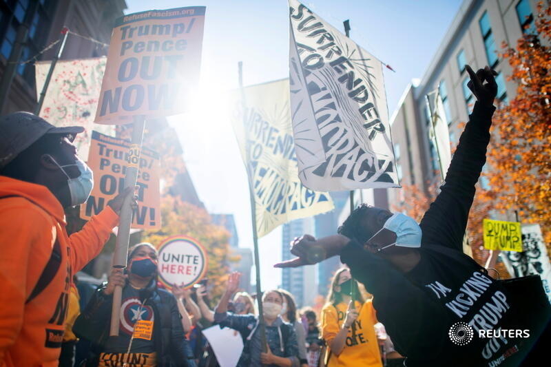reuterspictures's tweet photo. Activists dance in celebration after Joe Biden overtook Donald Trump in the Pennsylvania vote count, across the street from where ballots are being counted in Philadelphia. More #Election2020 live updates: https://t.co/vQstbs89Ez 📷 @mark_makela https://t.co/cfTQIdXNPl
