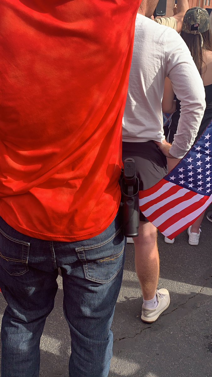 Organizers from yesterday’s rally asked attendees to NOT open carry. So far, we have counted about 10 handguns and one AR-15. It is unclear if that same request was made for today’s gathering.