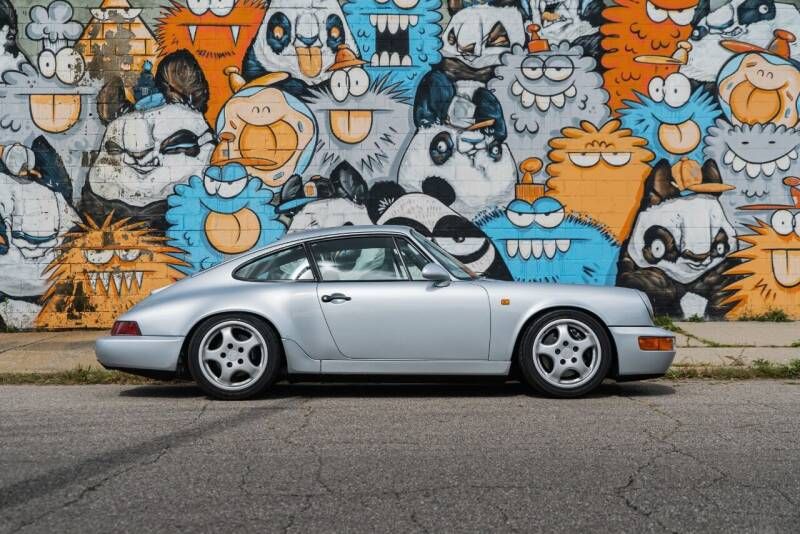 porschelife31's tweet photo. This 1992 #Porsche 911 Carrera RS is just 1 of 1,992 examples ever produced. It is finished in Polar Silver over a Black &amp; Gray leather interior and has only been driven 38k miles. #Classifind

▶️ https://t.co/iNjRaCYaTI https://t.co/lqLpmXn1jQ