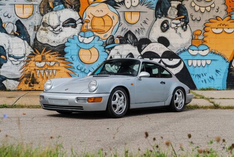 porschelife31's tweet photo. This 1992 #Porsche 911 Carrera RS is just 1 of 1,992 examples ever produced. It is finished in Polar Silver over a Black &amp; Gray leather interior and has only been driven 38k miles. #Classifind

▶️ https://t.co/iNjRaCYaTI https://t.co/lqLpmXn1jQ