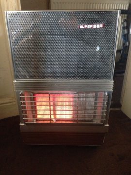 Number 10The Superser calor gas heater. In the hall for 'central' heating. The upside: very efficient. The downside: made the house smell like a scrapyard.