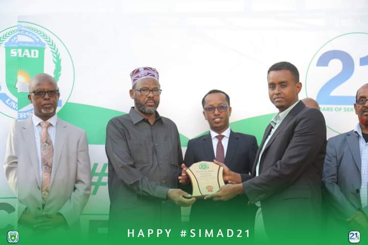 SIMADUniversity's tweet photo. Congratulations (Y)! Best Director Award of the Year 2020, Abdifatah Farah Ali. SIMAD University recognizes your hard work, enthusiasm, and commitment to excellence. 
#SIMAD21 https://t.co/wT1rHv5fua