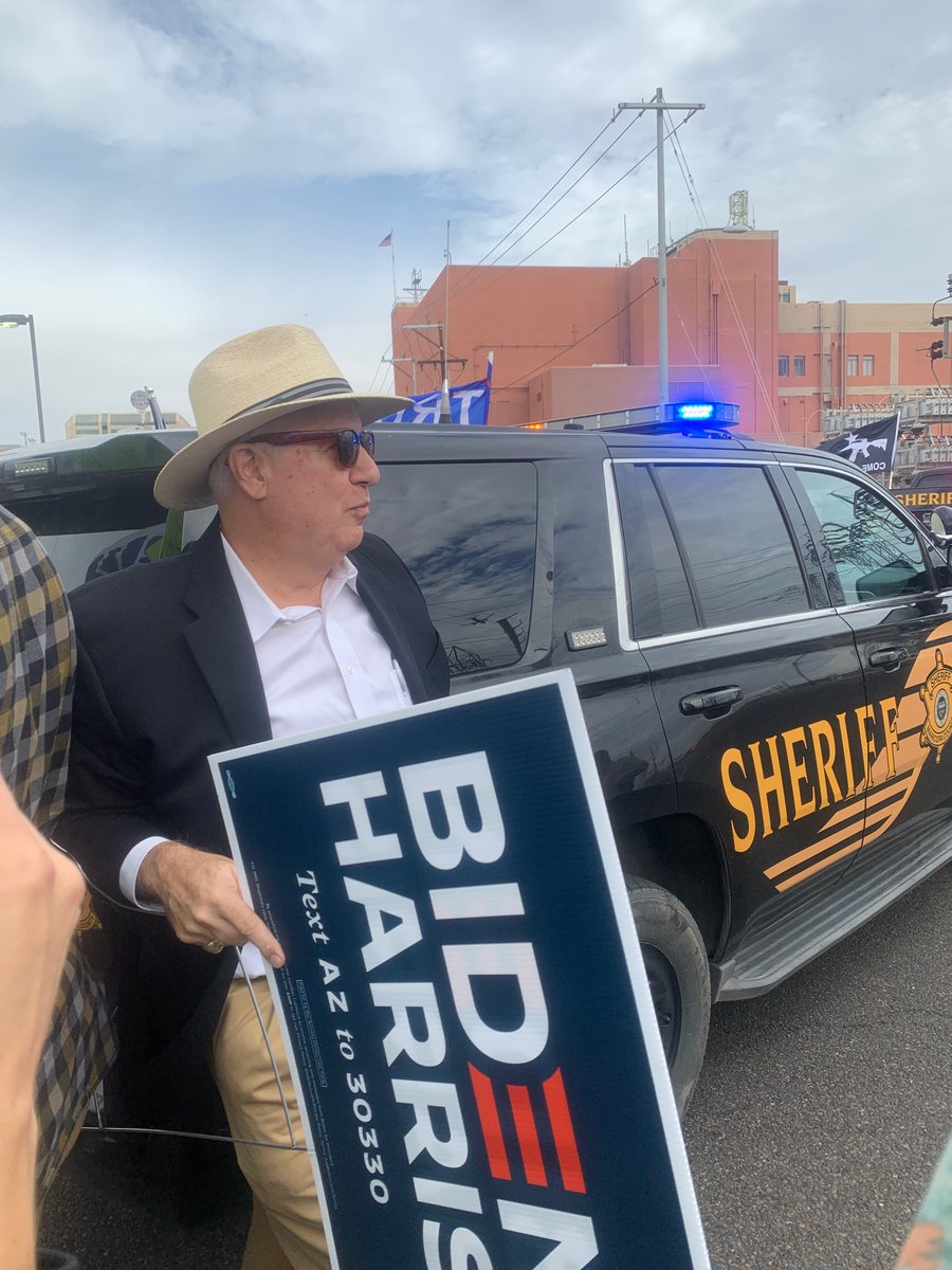 Sole man who gave his name as Ron just showed up here with a Biden Harris sign. Got shouted at. Police intervened. Trying to upload video