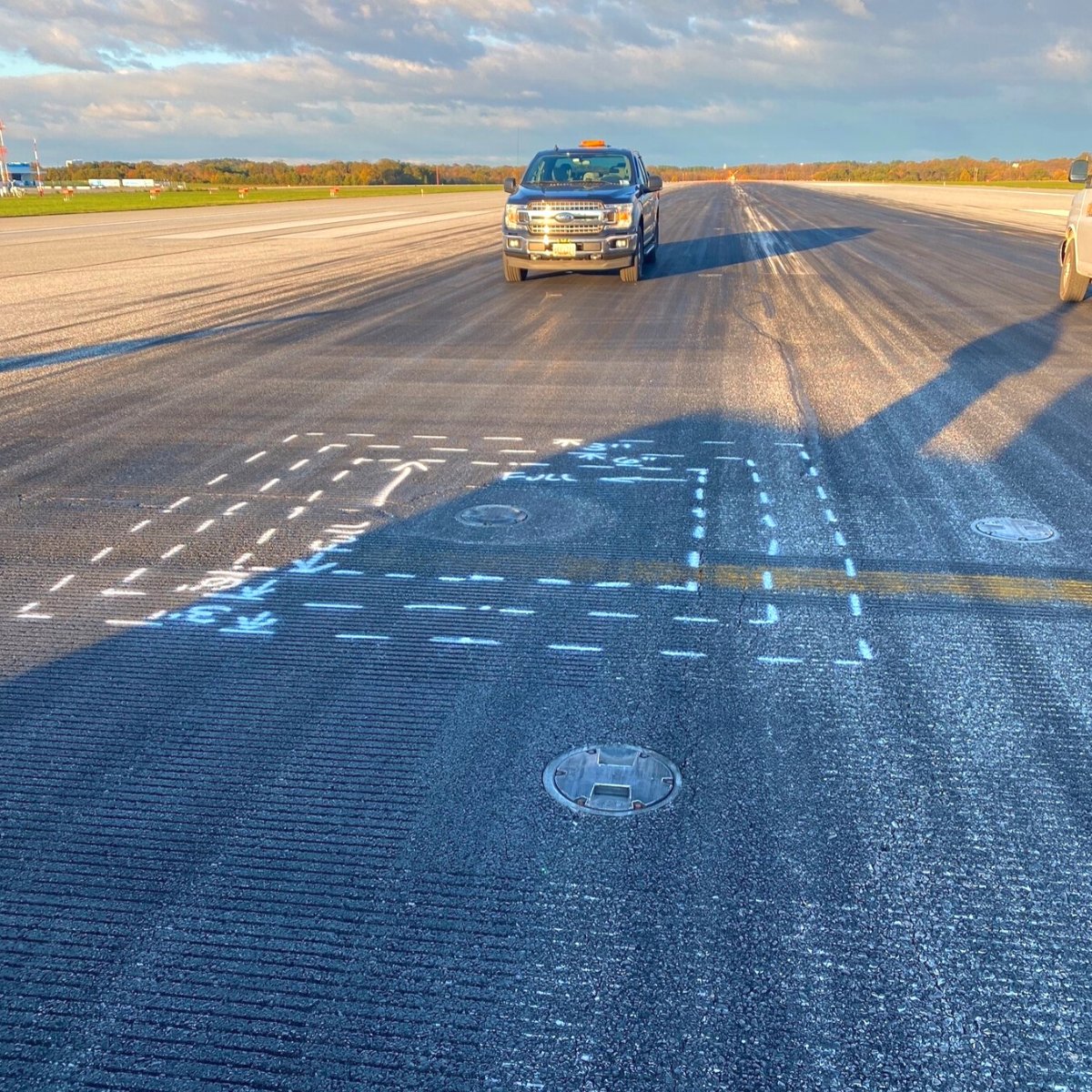 Photograph of runway status light (RWSL) repair at BWI Marshall Airport. 