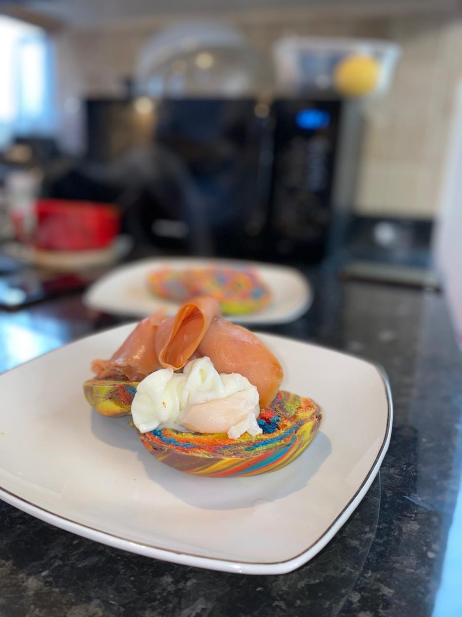 Chefvivianj's tweet photo. Brunch dish from @ambitious_mums launch. Eggs Benedict with a twist- Rainbow Bagel, Poached Eggs, Smoked Salmon and a Spicy Plantain Puree. 

This was inspired by @britishbakeoff . I watched the episode where they made the rainbow bagels and was inspired to try it out myself. https://t.co/9k3b5NkqgH