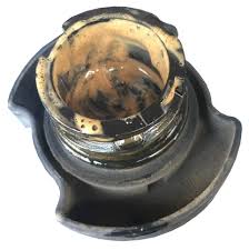 1. OILYou want to remove the fill cap and check the back of it. You don't want to see is light-colored froth on the back of the cap it indicates coolant and/or water in the oil. A tell tale sign of a leaking or blown head gasket.1/2