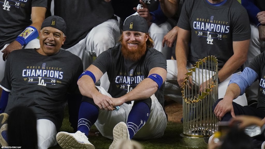SportsCenter's tweet photo. MLB commissioner Rob Manfred says Justin Turner will not be punished for celebrating with teammates on the field after the Dodgers clinched the World Series title, even after he was removed from the game for testing positive for COVID-19. https://t.co/FmSCssLoEN