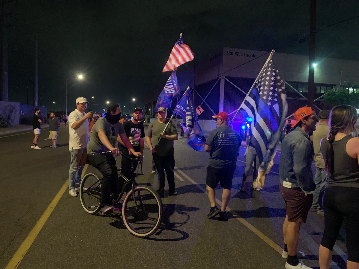Guy on the bike showed up to ask people: “why are you protesting?! They’re already counting the votes!”