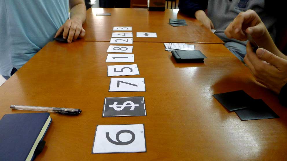 At this point the game was a bit abstract and players asked for more meaningful goals. I added a spot in the timeline that would reward players for getting there: $. They immediately started making plans. Not only to get there, but to stop others from doing so.