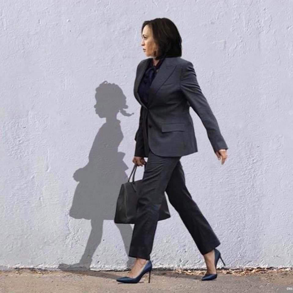 Madam Vice-President-elect Kamala Harris and the silhouette of Ruby Bridges when she was walking to an all-white school, newly desegregated, escorted by four deputy US marshals in 1960.