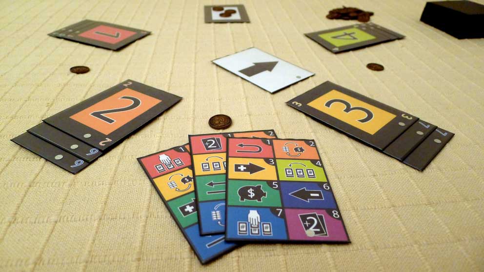 From the "$" alone the players started to make stories in their heads. They started calling it a bank and I rolled with it. Now there was a mechanic where the bank would fill up over time and the players could collect from it.I added colors when the iconography was clear enough.