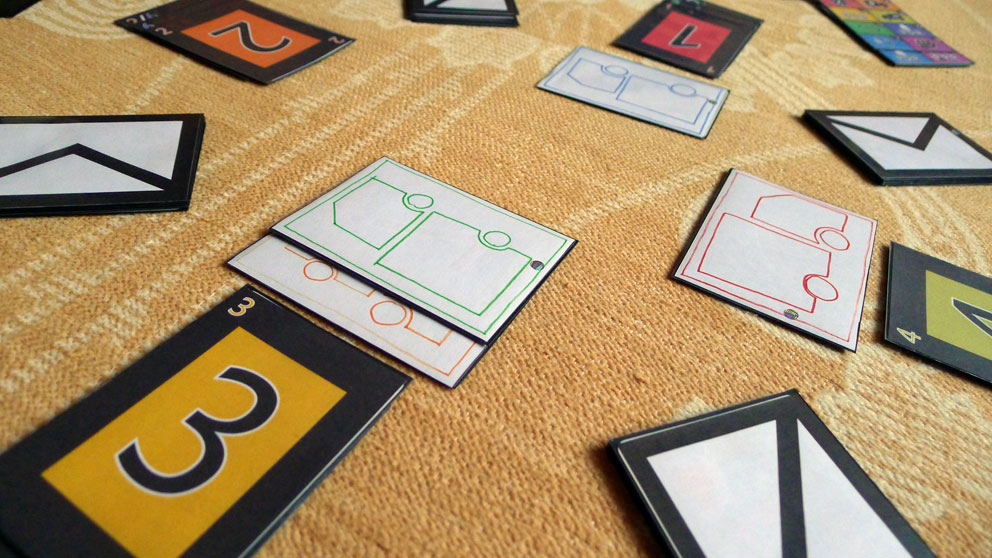 I showed it to  @MEBOgames, who wanted to distribute it to big post offices, which in Portugal also sell things about the country and its culture.The numbers turned to regions, coins are now envelopes. The bank is gone and instead of a single ticker, each player had a van.