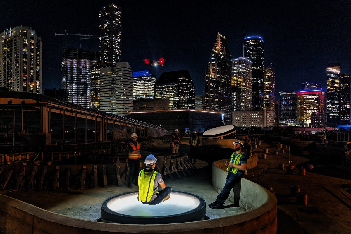 AdamWillyums's tweet photo. Action shot, evaluating light levels of the illuminated walkable skylights on the rooftop of POST @DowntownHouston #houston #posthtx #dthou #houstonskyline https://t.co/Z2JxTN2LSC