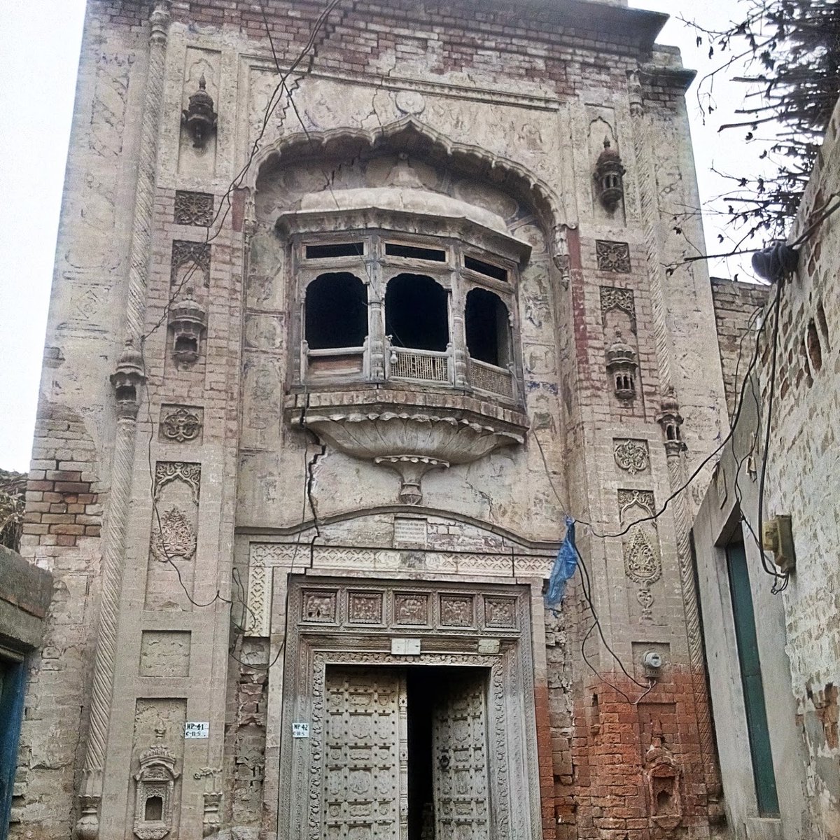 From the Hujra, at a 'glance length' is visible, shikara of an old templeStorytellers of Malka Hans would tell you with a wink, of an ancient love affairOne Bhag Bhari whose love inspired Waris Shah to write the epic tale of Heer