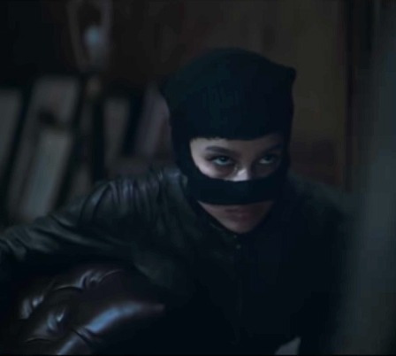 Catwoman at her core is a costumed thief, so seeing her fancy cowl replaced with the most classic of burglar fashion, the balaclava, is a simple and smart way to ground her costume.