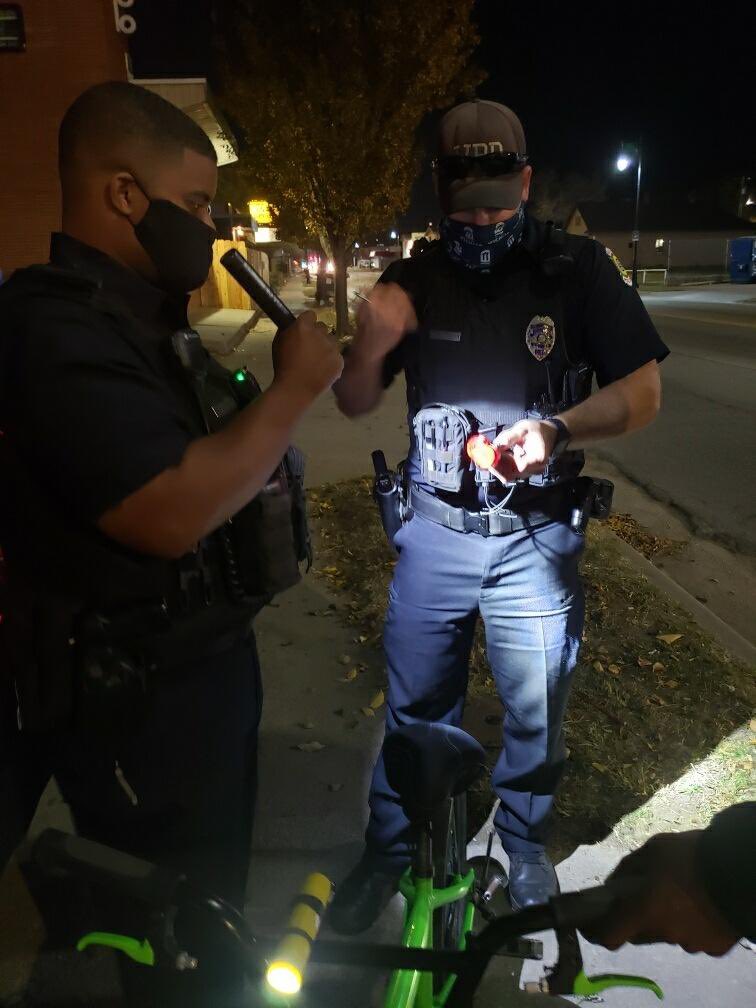 WichitaPolice's tweet photo. Tonight, Bike, Walk Wichita and the Broadway Corridor Team teamed up to give away free bike lights. Several lights were given to cyclists without front lights. #WPDCARES #ictproud https://t.co/E1xUYoxAwS