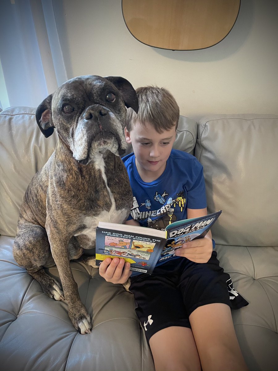 CaregivingMike's tweet photo. Everett reading to Moose and of course Lucy had to get in on the action. #readtoyourdogman https://t.co/WFHBhvXwBf