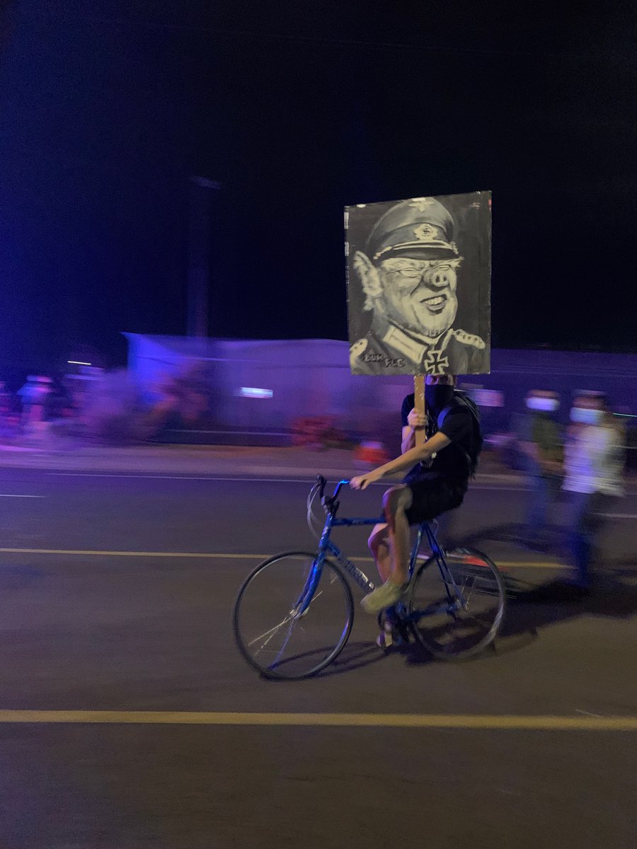 This guy is back. He got shouted down/confronted yesterday over this sign but today nobody is reacting much.