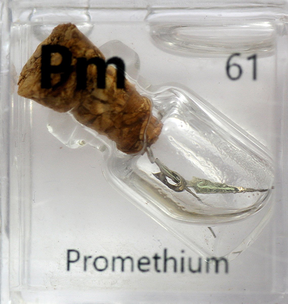 Promethium  #elementphotos. Promethium is radioactive, with about the only feasible source being old watches that use Pm-based paints for glow-in-the-dark displays. I managed to find & cannibalise one - hands went in one element set, 'dots' on dial went into others.