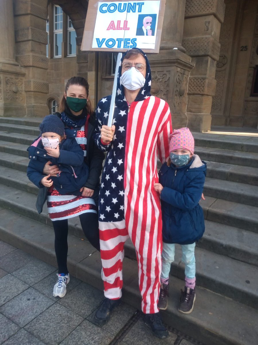 DemsAbroadDE's tweet photo. Our @DemsAbroad members gathered in Bielefeld today for a #CountEveryVote rally. Even came in their American flag onesie! #DAResists #EveryVoteCounts #CountTheVotes https://t.co/Dj4v8DBK30