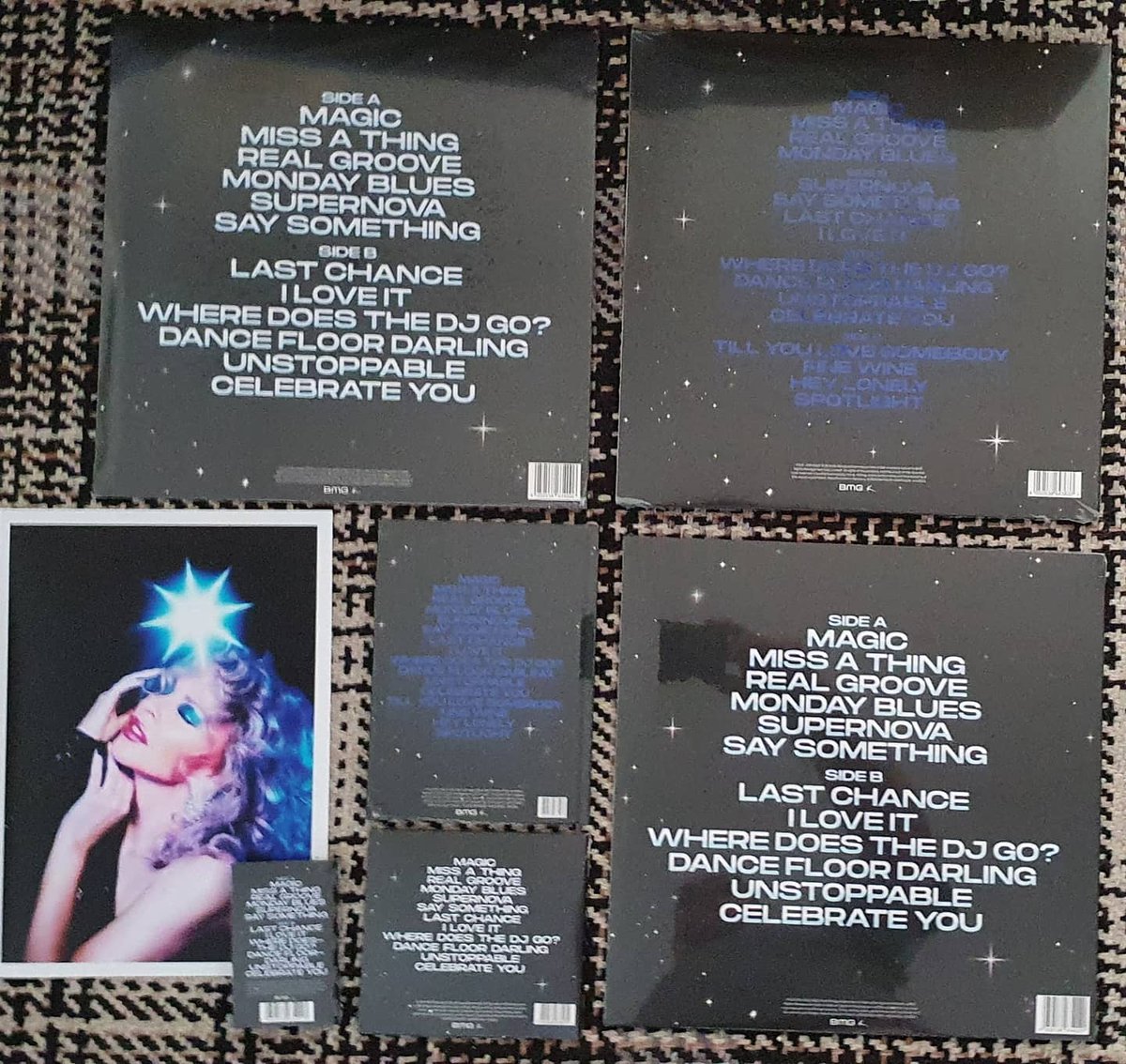 derekcburgess's tweet photo. Today's @kylieminogue #Disco delivery #BlueCassette #BlackVinyl #ClearVinyl #DeluxeMarbledTwoDiscVinyl #DeluxeCD #StandardCD https://t.co/tkrywWs2t4
