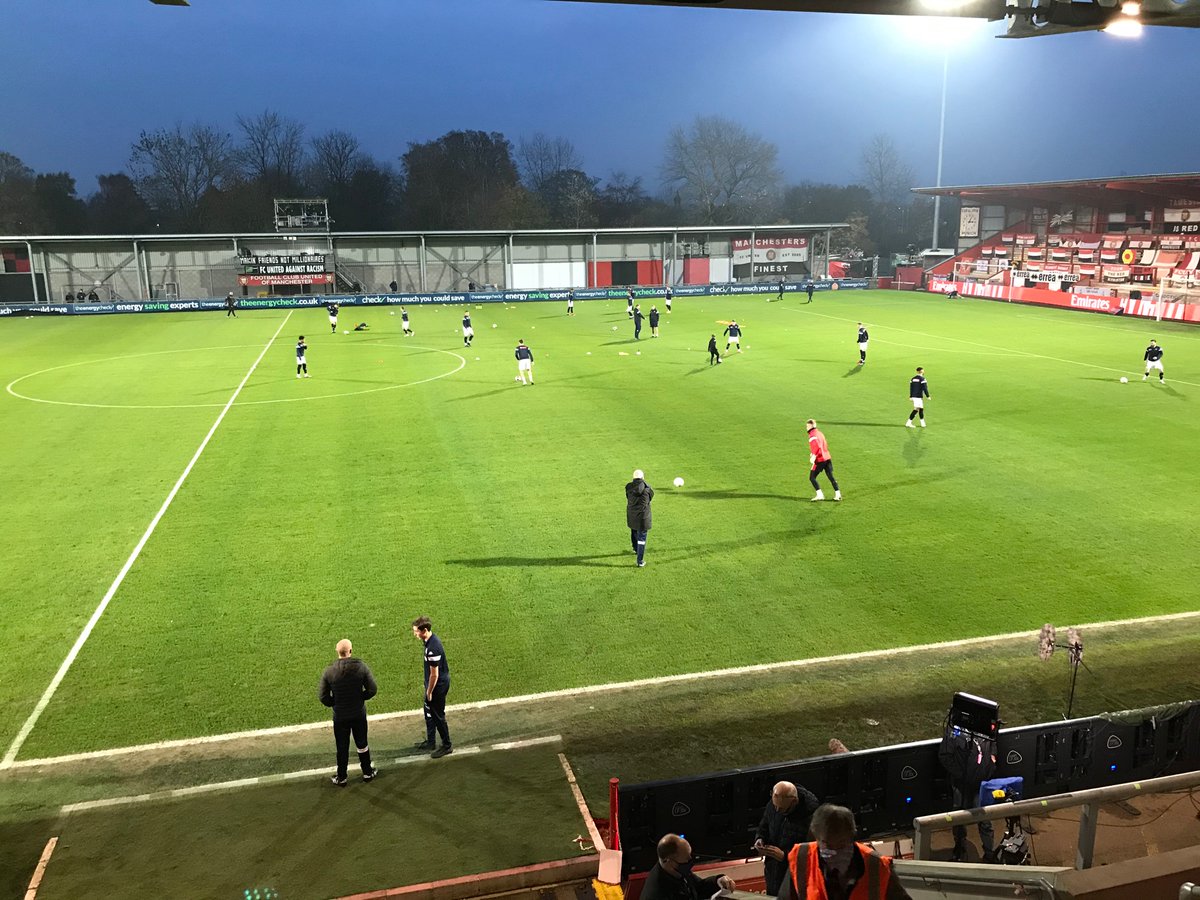 FCUnitedMcr's tweet photo. FC are out for the warm up - team sheet coming up next 

🔴⚪️⚫️ https://t.co/S04YdMpRbo