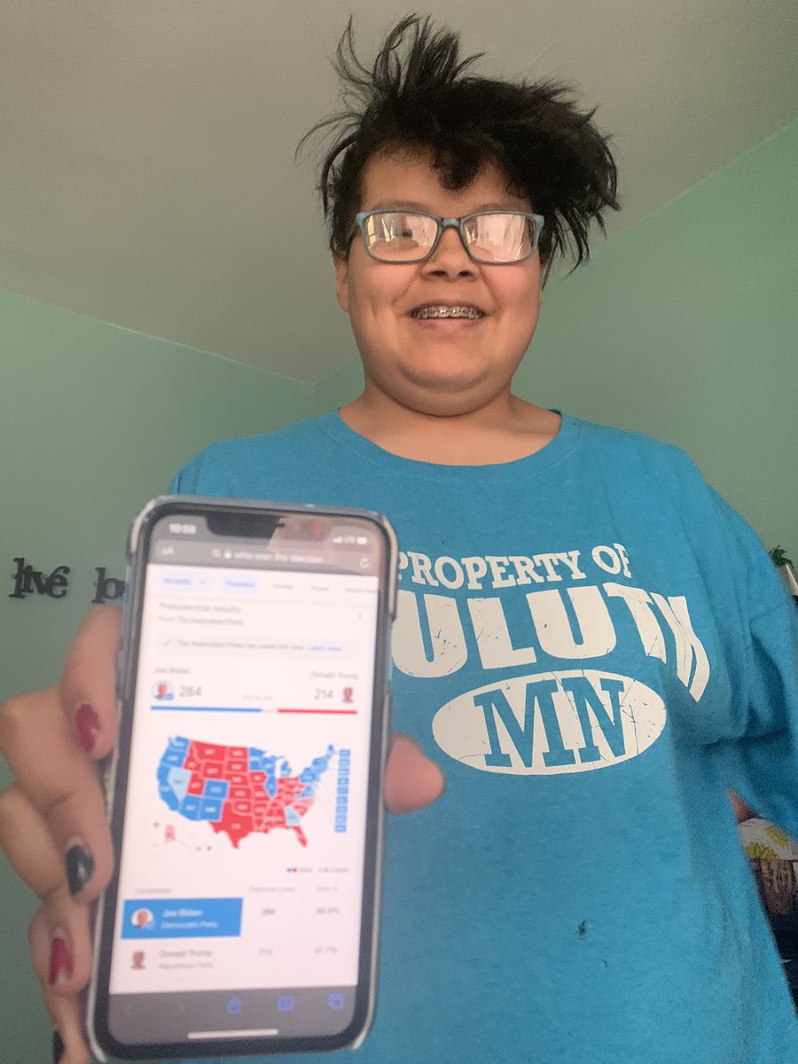 Renee_4Duluth's tweet photo. My kid came down to share her excitement! I am so happy my babes! CNN said Native Americans played a big role in this win, along with the African Americans! #bidenharis2020 #46yes! #UnityIsAmust! #273 #SoHappy https://t.co/nUTG9McQsK