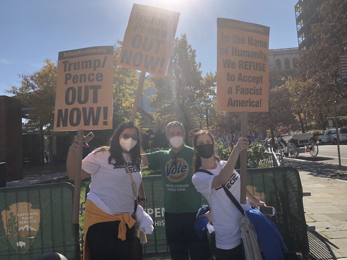 RefuseFascism's tweet image. Happiness and hope at the prospect of Trump leaving office! #TrumpPenceMustGo!