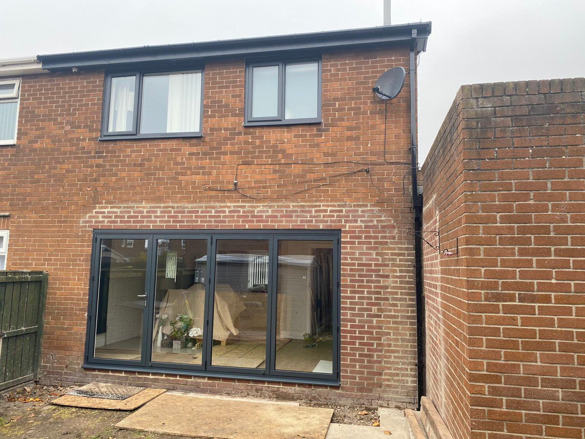 WindowanddoorNE's tweet photo. Another happy customer! All new modern style anthracite windows, matching bi fold doors and a SWS anthracite roller shutter garage door. #windows #anthracitegrey #bifolddoors #rollershutter #windowsnewcastle #windowsdurham https://t.co/VFCi9icdRP