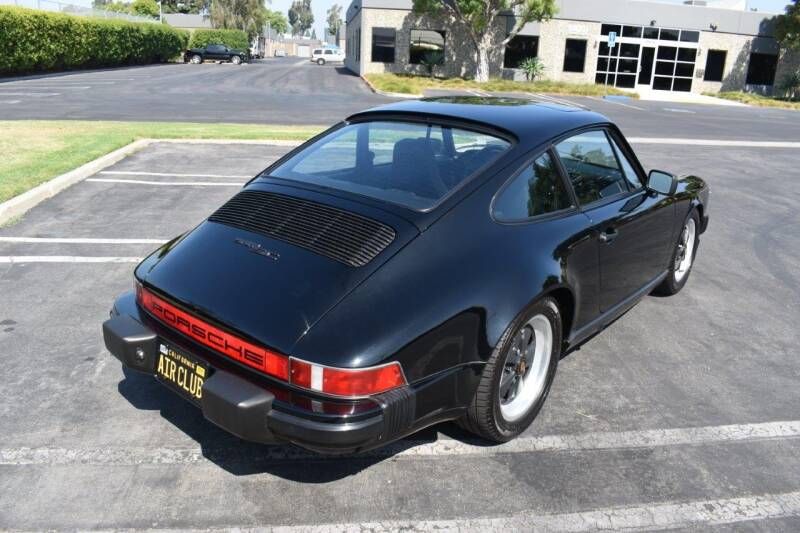 PorscheMarket's tweet photo. This 1983 #Porsche 911 SC Coupe is finished in the classic Black over a Black leather interior. It has a 3.0L flat-six engine with just under 71k original miles that is paired with a 5 speed manual transmission. #Classifind

▶️ https://t.co/Ml5qMdVKfj https://t.co/i2f1IXtRR3