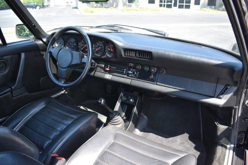 porschelife31's tweet photo. This 1983 #Porsche 911 SC Coupe is finished in the classic Black over a Black leather interior. It has a 3.0L flat-six engine with just under 71k original miles that is paired with a 5 speed manual transmission. #Classifind

▶️ https://t.co/l5AO2zI94K https://t.co/wR2WlCrSs2