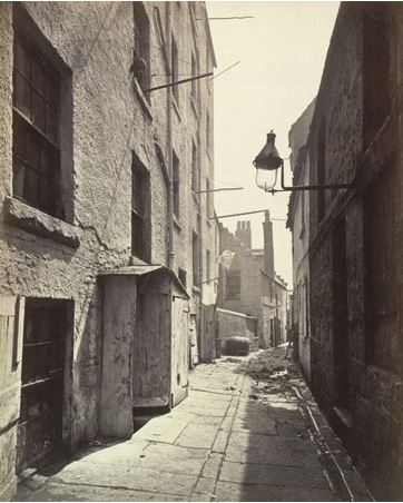 By the uncertain light of a small glimmering fire, we can recognize at a glance the wretchedness of the abode. It reminds us more of a charnel house than a dwelling place for the living. Amid this desolation sits the afflicted widow in her faded tattered tweeds.