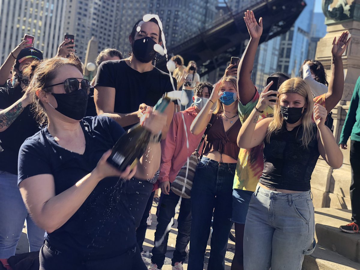 OmarJimenez's tweet photo. People are now popping champagne across from Trump Tower in Chicago, as a celebration grows near Michigan Avenue. https://t.co/cHmf5b0dI7
