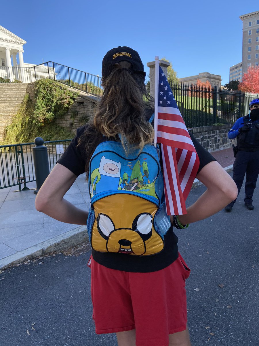 infowars hat, adventure time backpack, ready to roll.
