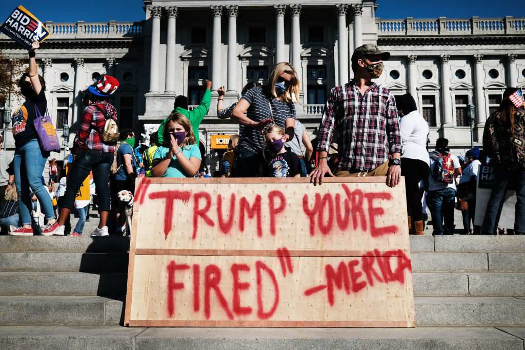 business's tweet photo. PHOTOS: Supporters of Joe Biden and Kamala Harris celebrate the end of Donald J. Trump's presidency #Election2020 https://t.co/kGIbeKhQ5f https://t.co/xodahFcG0u