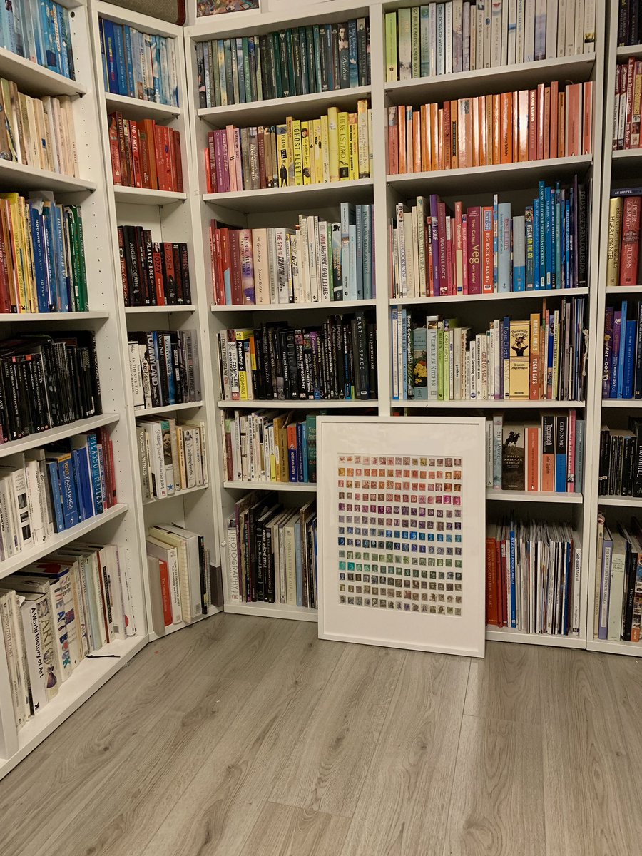 LouiseClazey's tweet photo. Found a tatty old stamp album in the cupboard, so decided to make something out of it this afternoon. Several hours later and I now have something lovely and colour coordinated to hang on the wall in our snug. I never realised how beautiful some stamps actually are. https://t.co/R2GbNCKg9L