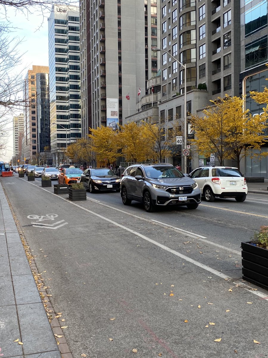 derfrebel's tweet photo. See any bikes? Just idling cars on Bloor St. in a constant traffic jam. Are we putting a dome on the city to make sure bikes can mess with traffic all year? https://t.co/MPKpgF4rTY