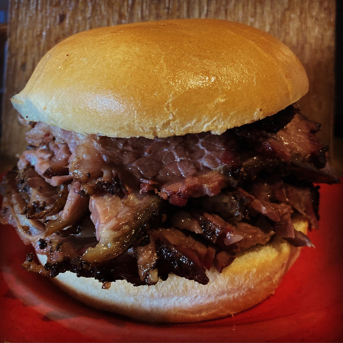 LuLu’s Pit BBQ Sandwich with double brisket...😮🔥Come check out our newly configured indoor dining areas for your safety and enjoyment. Our hours are 12-8 pm / 7 days a week. Our pick-up window has moved to our back patio. Call 720-583-1789 for take-out. ✌️💗🔥